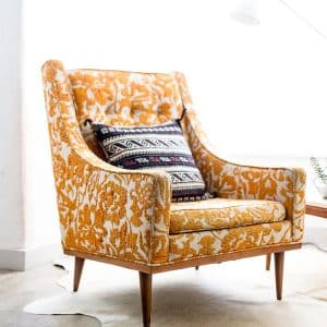 Photo of decorative orange and white flowered chair