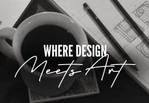 Coffee cup, notebook and pencils in black and white with text "Where Design Meets Art" overlaid